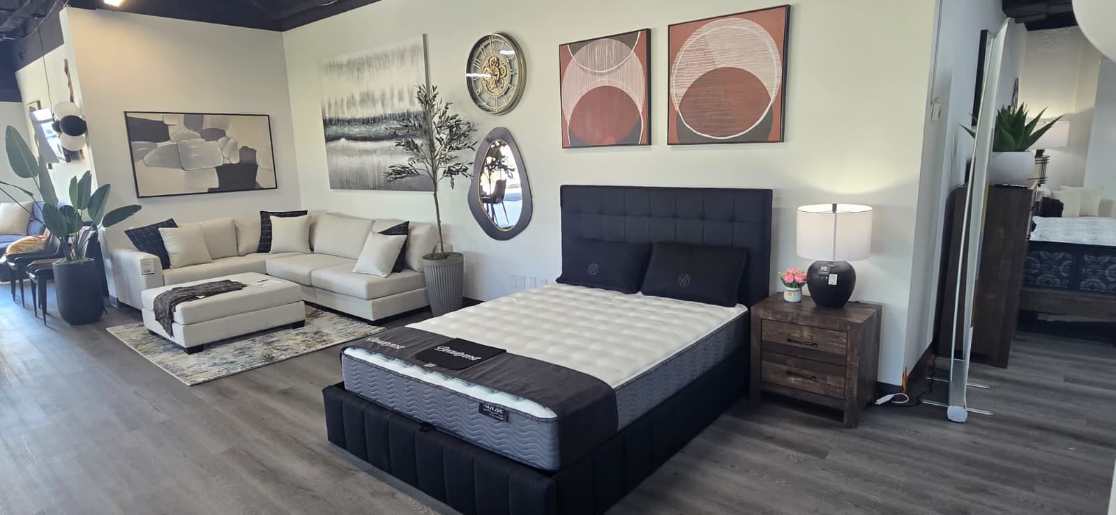 A bedroom and living room vignette in the Rockwell Home showroom